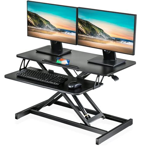 fitueyes standing desk converter sit to stand up desk with keybroad tray stand for dual monitors