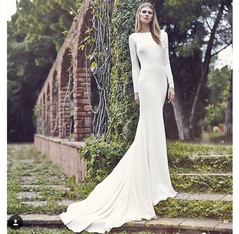 Pin By Kelsey Griswold On Wedding Goals Minimal Wedding Dress Wedding Dress Long Sleeve