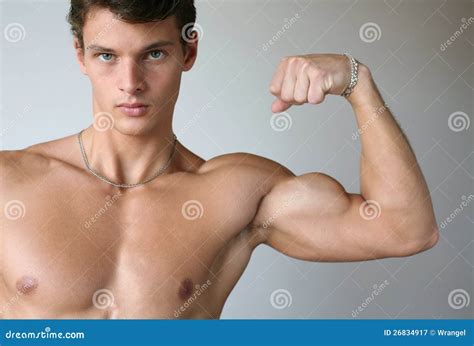Muscular Man Flexing His Biceps Stock Image Image Of Chested Looking