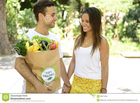 48 cute instagram captions for couples for every photo . Couple Carrying Shopping Bag With Organic Food. Stock ...