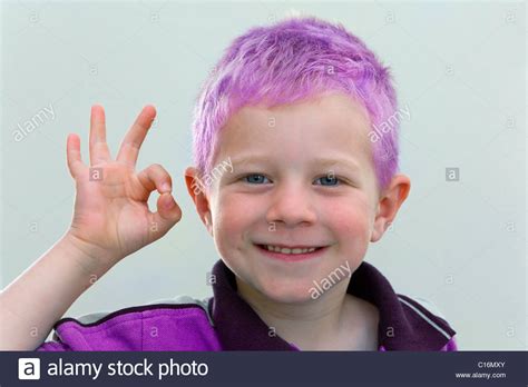 # purple 23533 # hair 11791 # boy 92562. A four-year-old boy with purple hair wearing a purple ...
