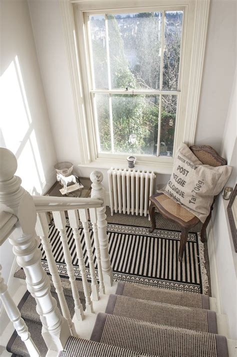 To decorate the stairs paint them in different colors, monochrome color scheme, or a color contrasting with the rails. Treasure Trove - The addition of a chair to a stairwell ...