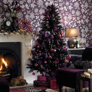 Decorate your mantle with greenery, then add ribbons and ornaments for a pop of color. Purple Xmas | Architecture & Interior Design