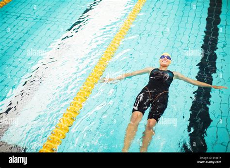 Swimmer Floating In Pool Stock Photo Alamy