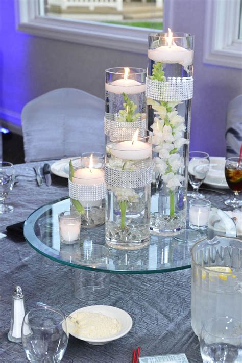 Best of all, including some centerpiece ideas into your party planning process could revive the habit among those in your circle—before you know it, everyone will be putting together simple. Dining Room, Modern Sand And Candle Centerpieces Design ...