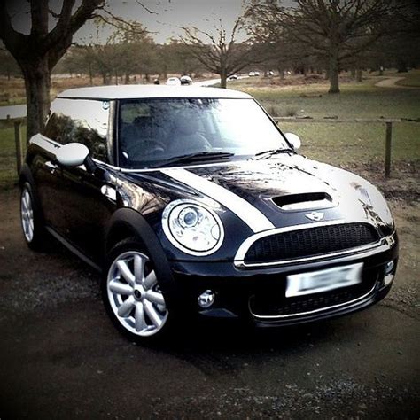 Black Mini Cooper With White Roof And Stripes