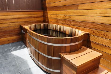 After he ordered the hot tub to his specifications, it was ready to be built with the help of his friend. Japanese Wood Ofuro with Wood Fired Heater | Cedartubsdirect