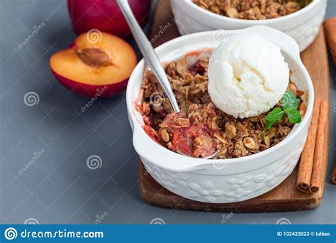 Plum Crumble Pie Or Plum Crisp With Oats And Spices Served With Stock