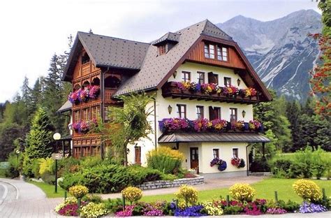 Austrian Alpine House In Full Bloom German Houses Alpine House