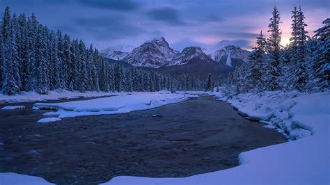 Alberta Canadian Rockies Mountain River Covered With Snow