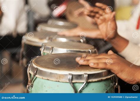 A Drummer In Action Playing Bongo Stock Photo Image Of Drumstick