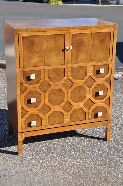 Select a filing cabinet with features like locking drawers for increased security or casters for mobility. Mid Century Modern Burl Walnut Romweber High Chest | eBay ...