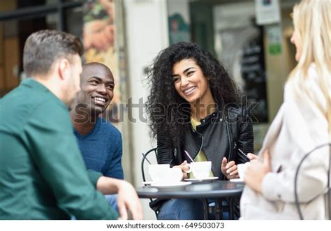 Multiracial Group Four Friends Having Coffee Stock Photo Edit Now