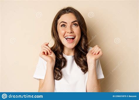 Close Up Portrait Of Enthusiastic Young Woman Rejoicing Shouting With Joy And Satisfaction