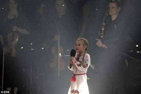 Seven Year Old Ukrainian Girl Let It Go Sings Her National Anthem At A Polish Stadium After