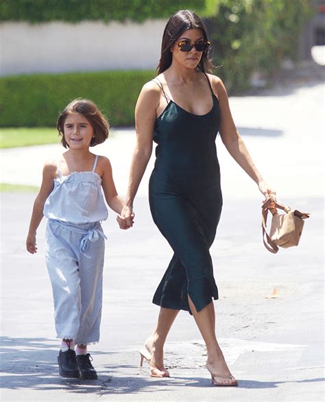 Kourtney Kardashian And Penelope Twin In Coats Photos Hollywood Life Celebrity Update