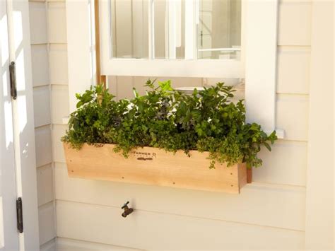 Decorative iron window box for potted plants. Window Box Edibles | HGTV