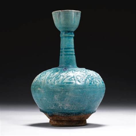 blue white persian jug bottle vase a kashan turquoise glazed moulded bottle vase persia