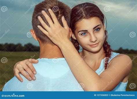 Beautiful Young Girl Hugging A Guy In Nature Stock Image Image Of Beautiful Female 127336003