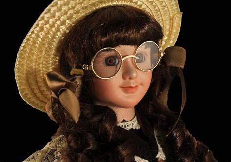 Collectible Porcelain Doll Doll With Round Gold Rim Glasses Straw Hat