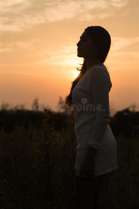 Silhouette Of A Young Asian Woman Stock Image Image Of Meadow