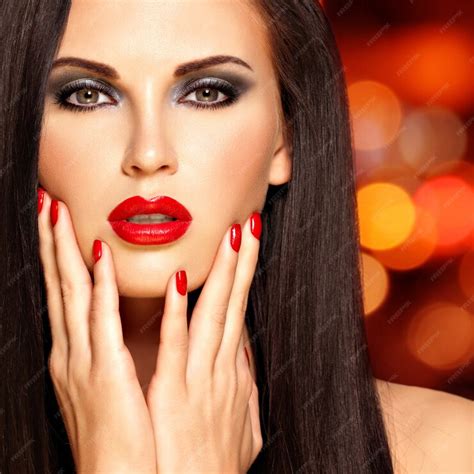 Free Photo Beautiful Brunette Woman With Red Lips And Nails Face Of