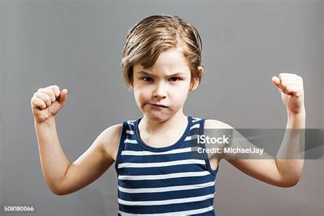 Little Sportive Tough Boy Showing His Muscles Stock Photo Download
