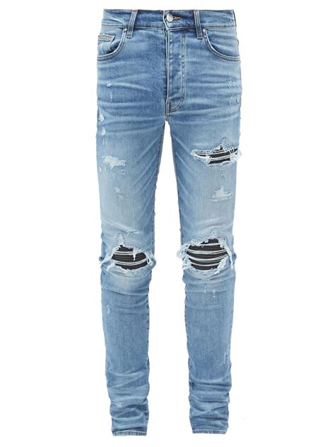 Amiri Mx1 Leather Panelled Distressed Skinny Fit Jeans In Blue For Men