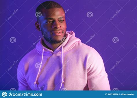African Man Ready For Sports Wearing White Hooded Sweatshirt Isolated