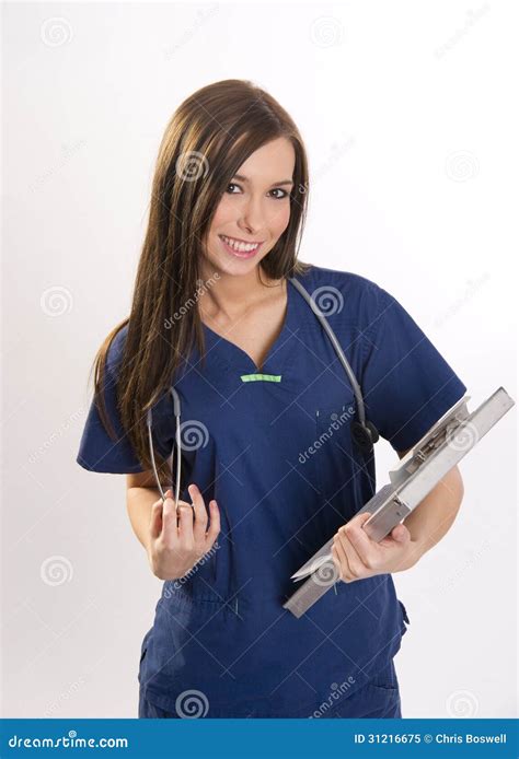 Beautiful Brunette Nurse Holds Patient Medical Chart Data Stock Image