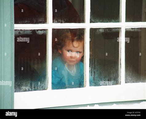 Gazing Through Window Stock Photo Alamy