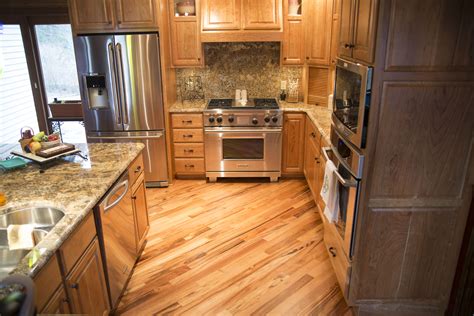 Concrete flooring works great for kitchens because it is virtually indestructible! Custom Hardwood Flooring Services - Wausau, WI | Signature ...
