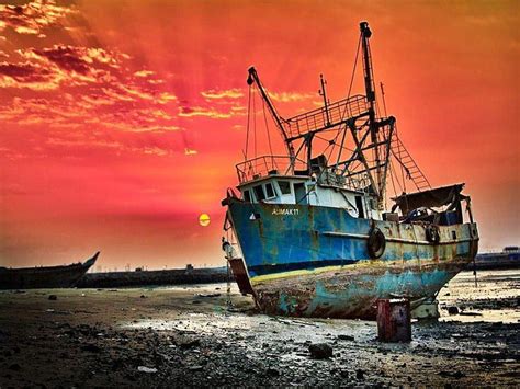Red Skies At Night Sailors Delight Red Shore Beached Ocean Ruins