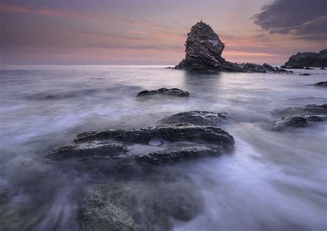 Sea Waves And Rock Formations During Golden Hours Hd Wallpaper