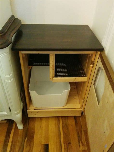 Two hidden cat litter boxes in a bestå bench. Hidden Litter Box With De-littering Cat Walk in 2020 ...