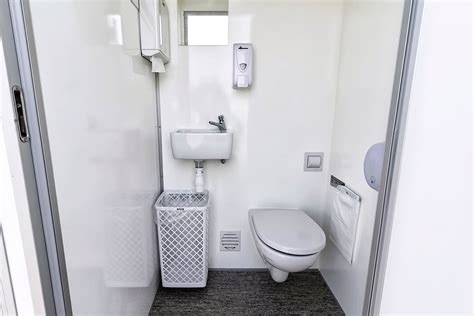 20ft type f the separate wc cubicle is replaced with a shower cubicle, which includes all fitting and a shower curtain. Toilet cabin 2-in-1 - Two toilets in one compact solution