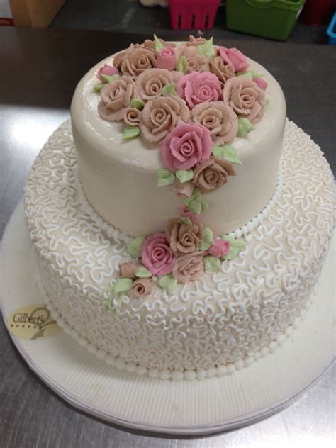 See more ideas about two tier cake, tiered cakes, cake. Simple lacy two tier traditional cake with buttercream ...