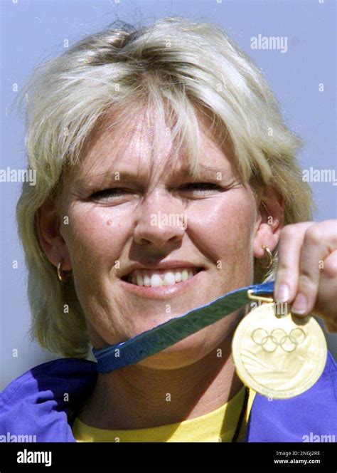 Swedish Shooter Pia Hansen Displays The Gold Medal She Won In The Women