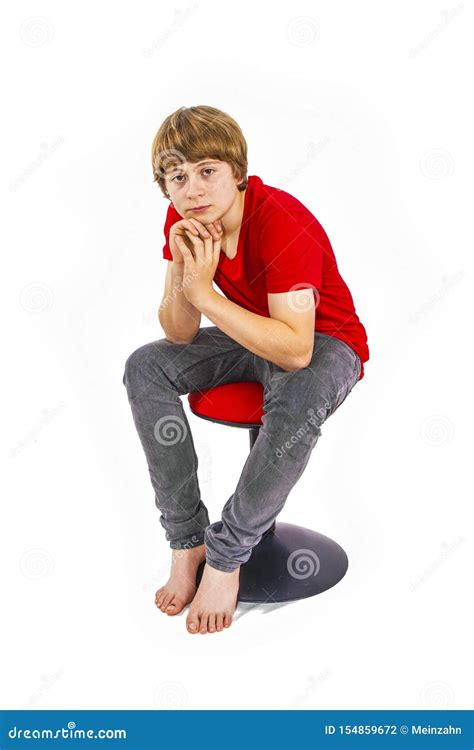 Teenage Boy Sitting On A Stool Stock Photo Image Of Space Portrait