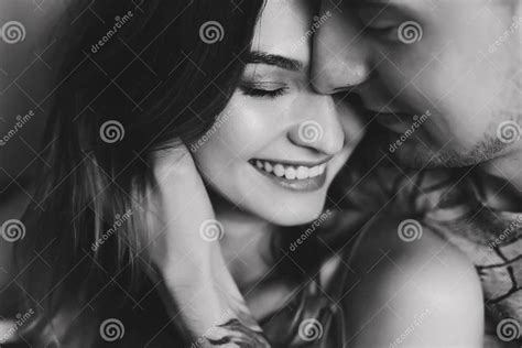 Kissing Couple Portrait Young Couple Deeply In Love Sharing A Romantic Kiss Closeup Profile