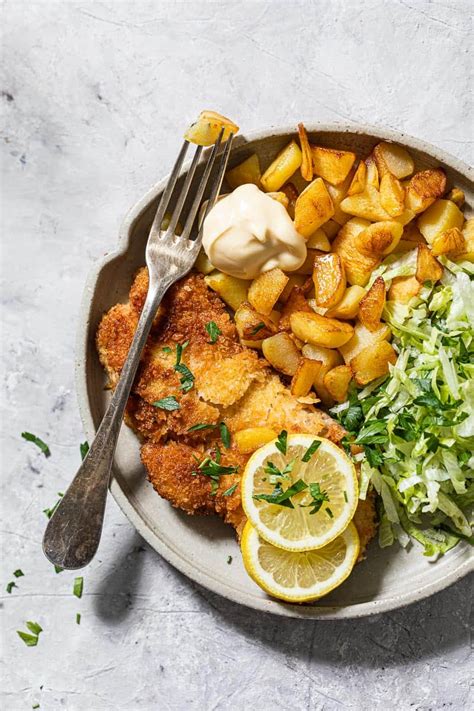 Schnitzels With Baked Potatoes And Lettuce Efoodchef
