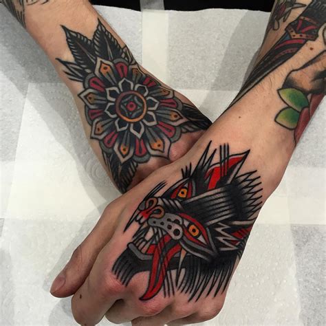 traditional hand tattoos cloak and dagger tattoo london