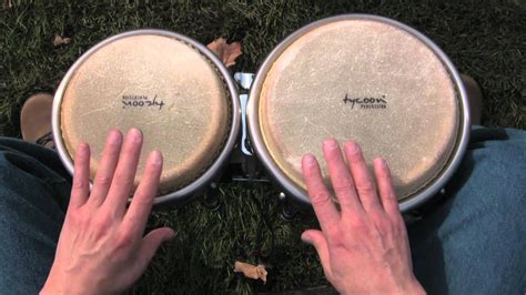 how to play your first rhythm on bongos a lesson for beginners bongos bongo drums drum