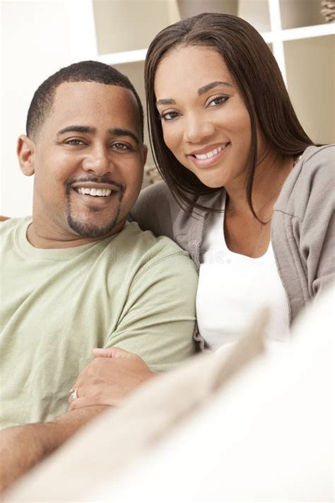 Happy African American Couple Sitting At Home Stock Image Image Of