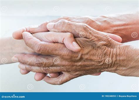 Reaching Out For An Old Woman Old Hands Hold Young Hands Support For