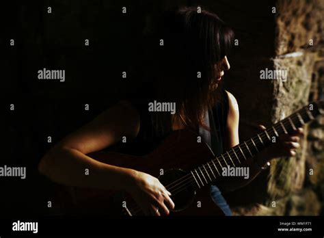 Mature Woman Playing Guitar Stock Photo Alamy
