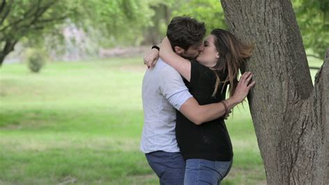 Man And Woman Passionate Kissing In A Public Park Couple