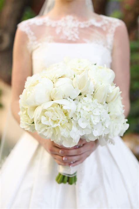 This Beautiful Bouquet Features Hydrangea Tulips And Peonies In White