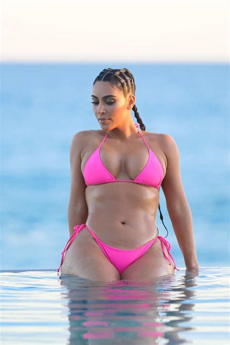 Kim Kardashian Strips Down To Pink Bikini In Mexico To Frolic Alone On