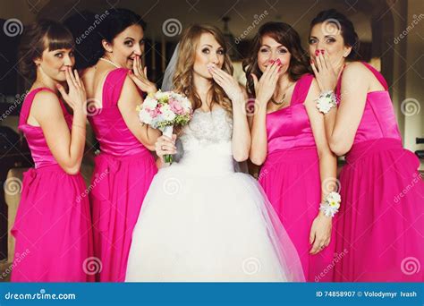 Bride And Bridesmaids Flirt Standing In The Restaurant Stock Image
